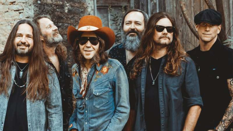 members of blackberry smoke pose for a photo