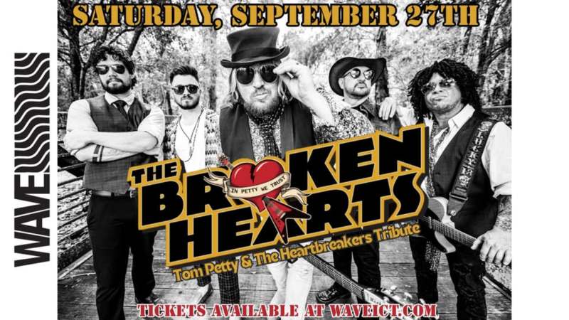 Members of the broken hearts band pose for a photo