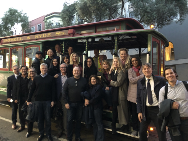 San Francisco Citywide Customer Advisory Council standing in front of a San Francisco streetcar