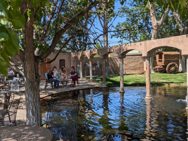 Four women sip wine at Casa Rondeña during a Vino Vans tour.