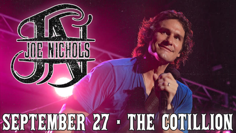 Joe Nichols is pictured during a peformance with a mic in his hand