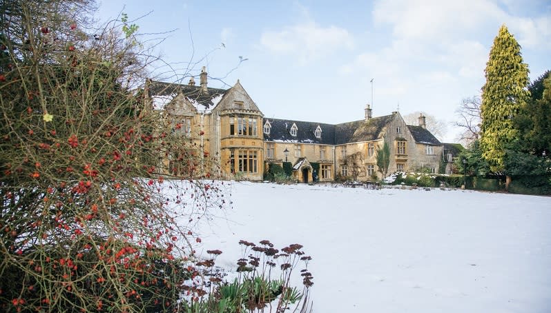 Snow-covered grounds lead to Lords of the Manor