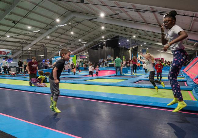 kids bouncing on the trampolines at skys the limit
