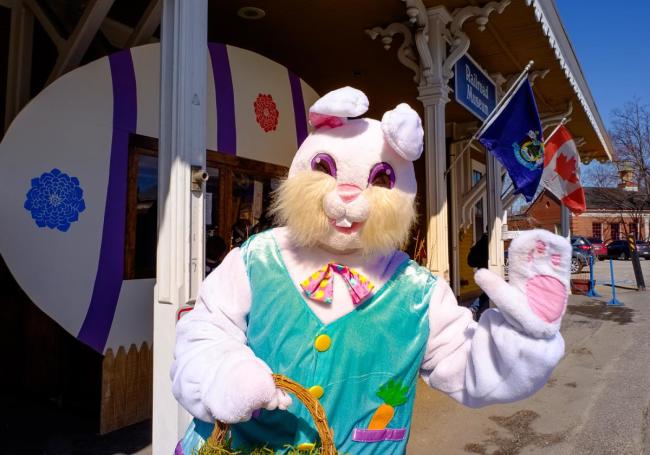 Easter Bunny waving at train station