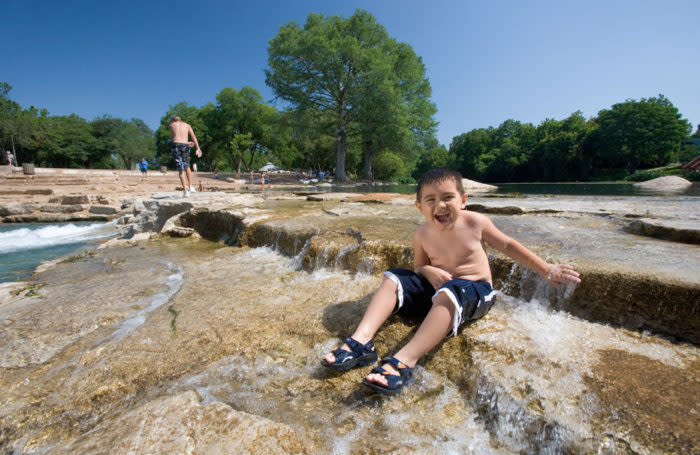 child on rocks