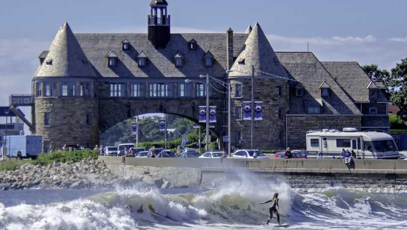 Narragansett Towers and surfer