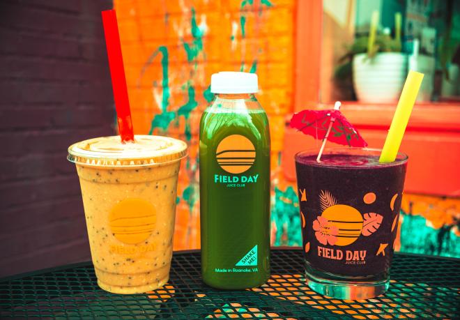 An exterior view with smoothies at Field Day Juice Club in Roanoke, VA