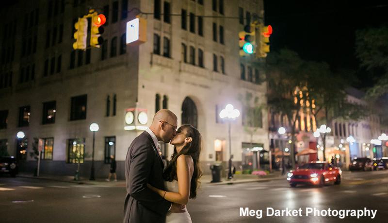 Couple kissing in downtown Ann Arbor