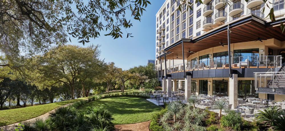Back patio of the Four Seasons Austin, overlooking Lady Bird Lake and the Butler Hike-And-Bike Trail.