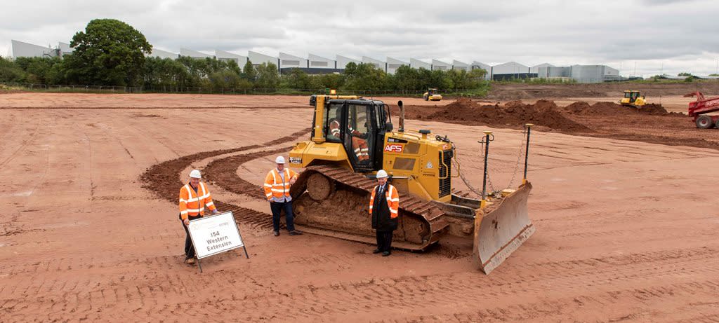Image captions (L-R): Staffordshire County Councilâ€™s economic growth leader, Cllr Mark Winnington, City of Wolverhampton Council Cabinet Member for City Economy, Cllr Stephen Simkins, and South Staffordshire Council Leader, Cllr Brian Edwards MBE, observing the start of main works at i54