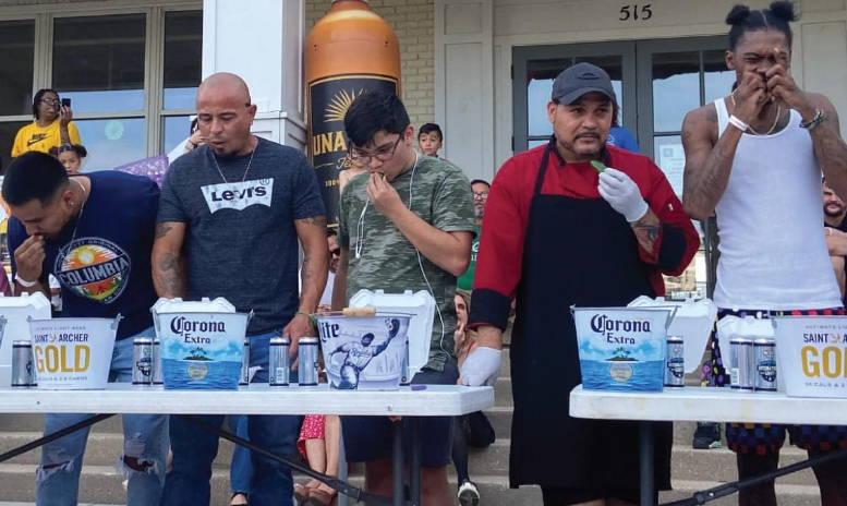 Five men battle it out in a jalapeno-eating contest at Tacos & Tequila