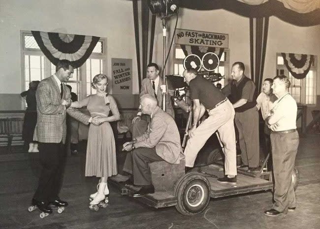 Howard Hawks (seated) directs Marilyn and Cary Grant in Monkey Business