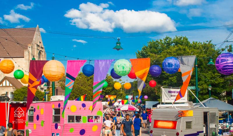 bright food trucks and decorations at PrideFest