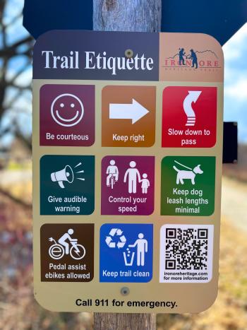 Trail etiquette sign on the Iron Ore Heritage Trail in Marquette County, MI