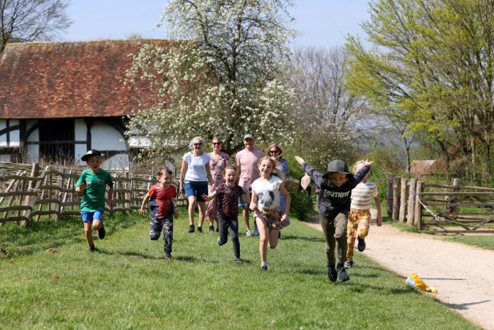 A family at Weald & Downland museum in Spring