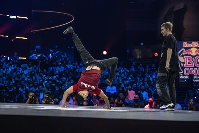 A breakdancer performing at a competition