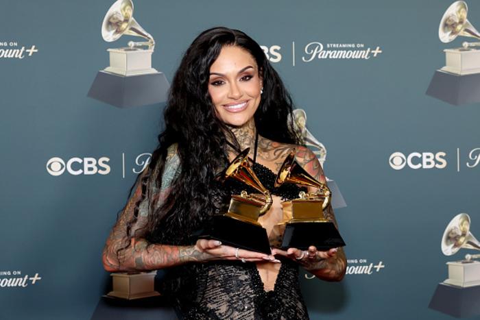 Khelani celebrating with her two grammys