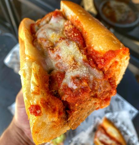 Image of half of a meatball sub sandwich from Cortina's Italian Market