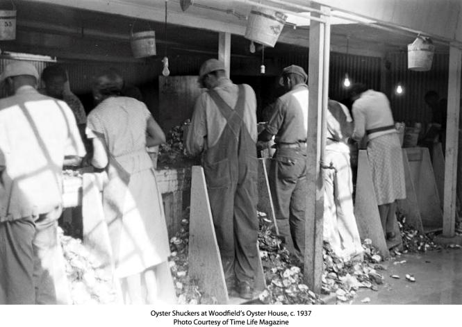 Oyster shuckers hard at work at Woodfield Fish & Oyster Company, c. 1937.