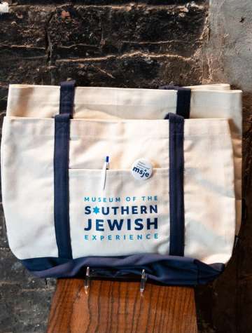 TOTE BAG WITH BOOKS FROM MUSEUM OF SOUTHERN JEWISH EXPERIENCE