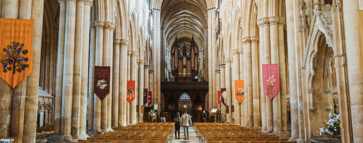 A couple exploring the magnificent Beverley Minster in East Yorkshire
