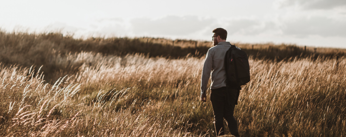A man walking through the East Yorkshire countryside in autumn