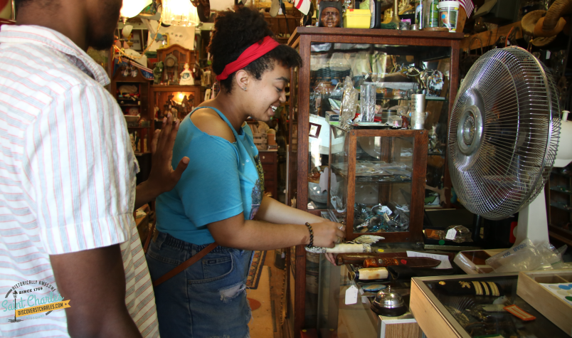 Man and woman shopping at an antique store in St. Charles, MO