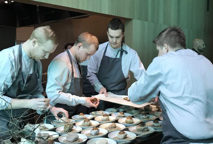 Chefs at work at Under underwater restaurant
