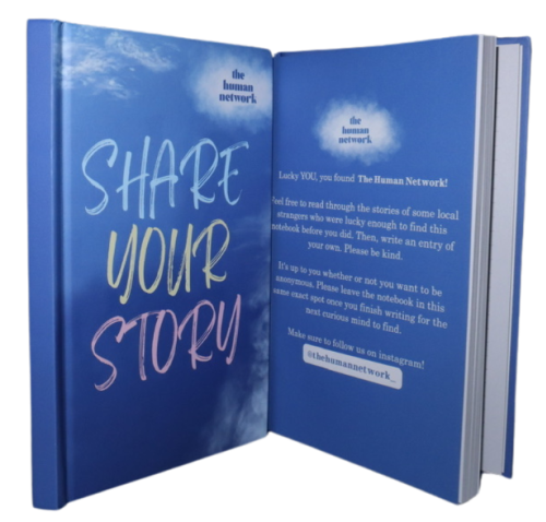 Blue book called Share Your Story from The Human network