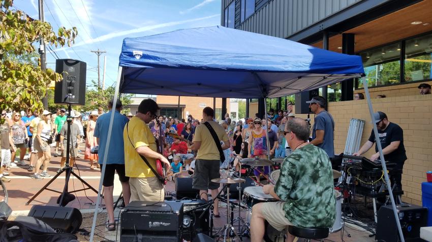 Band Playing in Front of CommunityWorx Thrift Shop at Carrboro Music Festival