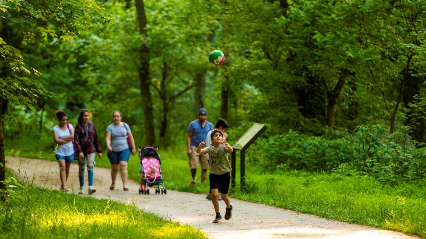 Family walking Riverwalk in Hillsborough