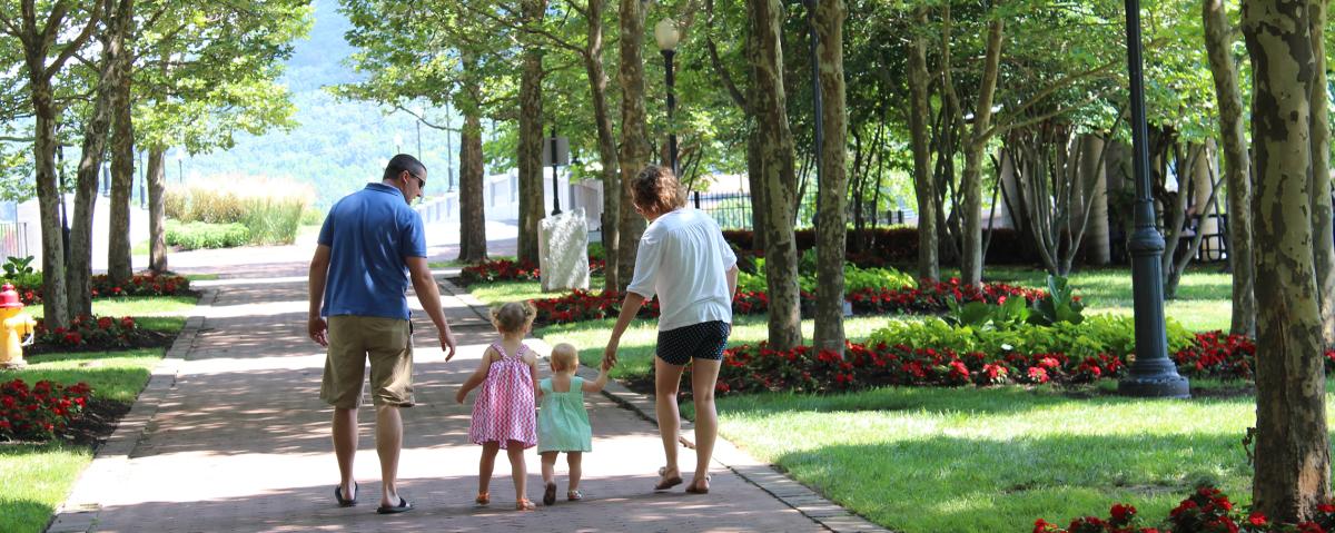 Family walking in Centerway Park