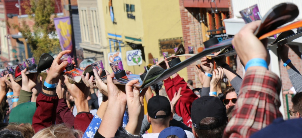 Crowd lift shot skis in the air