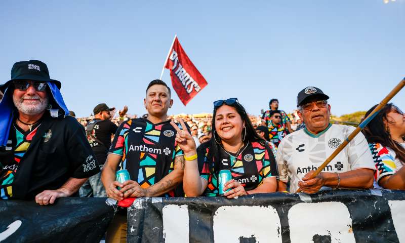 Close up photo of a family at the Oakland Roots game in Oakland California