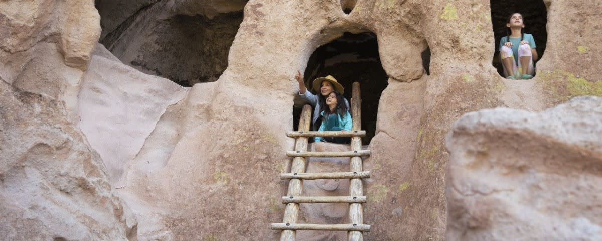 Family exploring Bandelier
