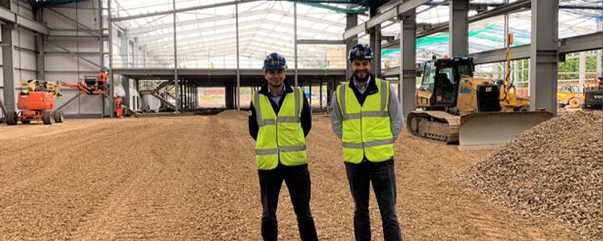 IAE managing director Frank Klucznik and IAE associate operations director Alex Venables in front of the new factory