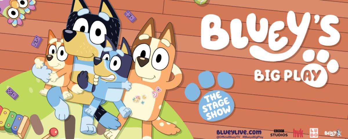 Cartoon dogs including Bluey grace the advertisement for the production of Bluey's Big Paly at Century II