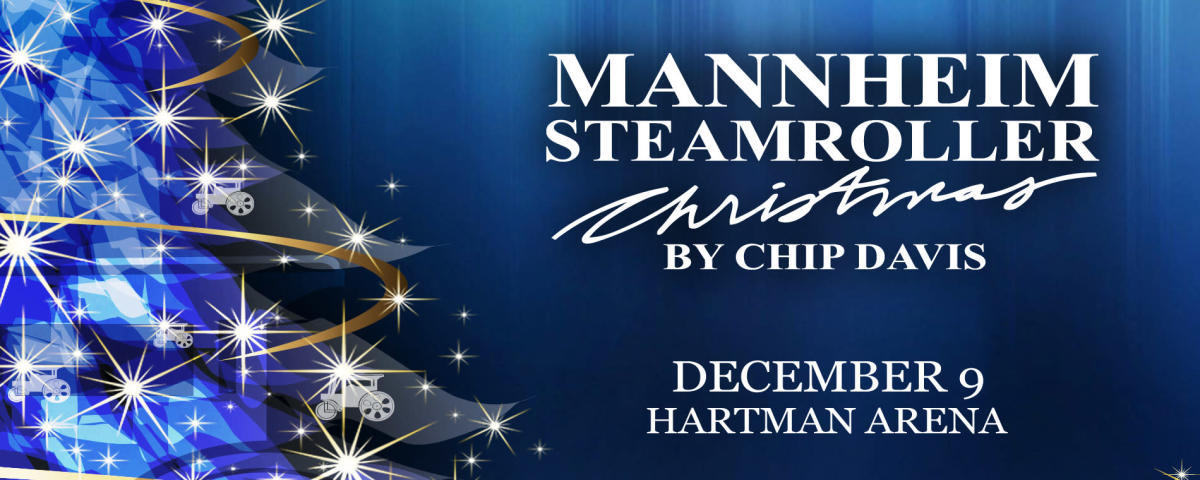 A poster with Christmas tree artwork advertises the Mannheim Steamroller Christmas concert coming to Hartman Arena in December 2022