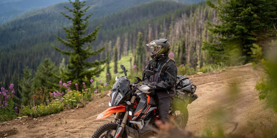 A motorcyclist riding in the mountains of Colorado