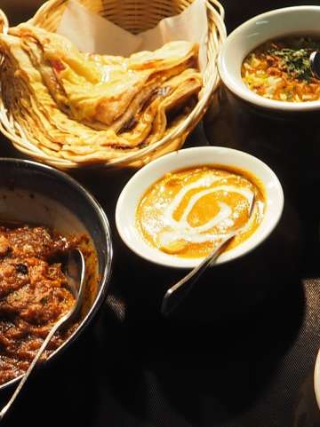 Plated meals and bread at Everest Indian Cuisine in Huntingdon Valley