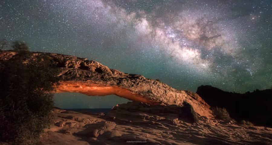 Mesa arch at night with milky way