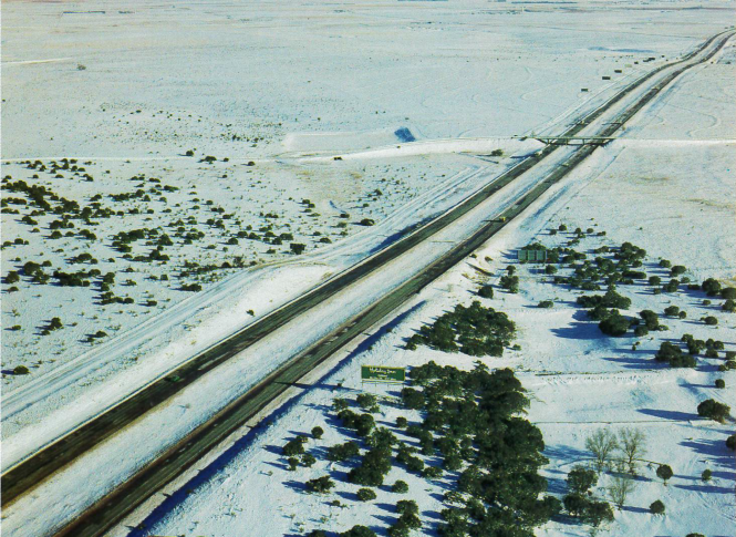 I-40 stretches eastward to Tucumcari from the Estancia Valley. Longtime photographer Paul Logsdon shot this image as part of his ongoing project