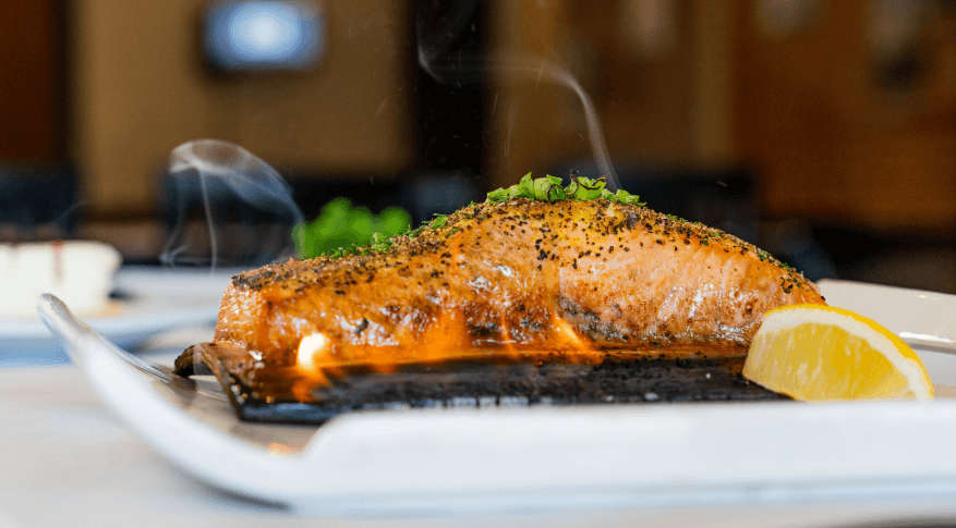 Perfectly grilled salmon entree served at Wyoming Rib and Chop House, one of the premier Cheyenne, Wyoming restaurants.