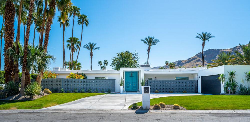 Bondi blue colored door at 2364 S Yosemite Way