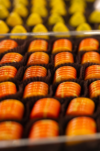 yellow and orange candy truffles
