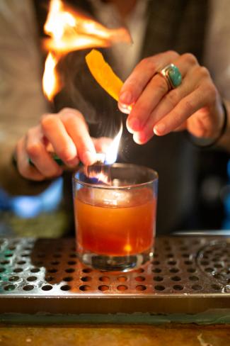 Hands making a cocktail at the Celt