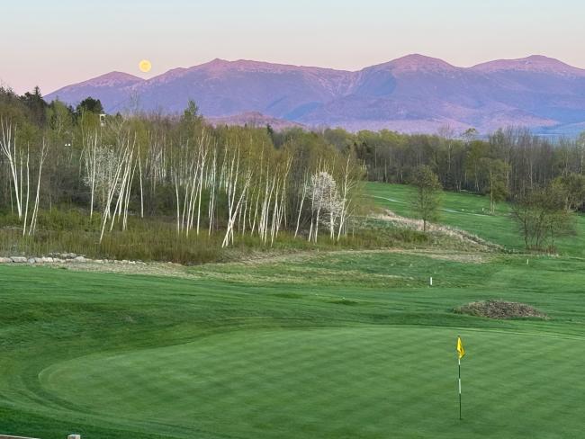 Waumbek Golf - golf course with mountains in background