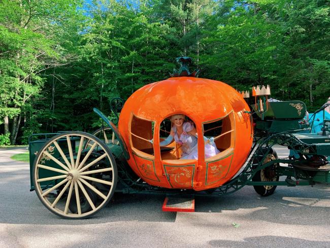 Cinderella Sitting Inside Story Land Pumpkin Coach