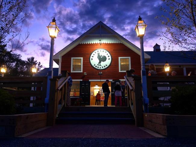 exterior of Weathervane Theatre at night