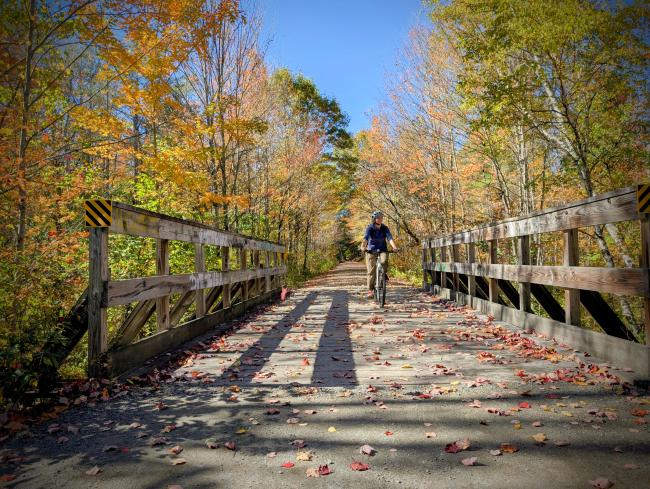 Littleton Rail Trail - Bicyclist Crossing Bridge